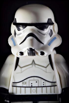 LEGO Stormtrooper figure with Helios 44 and Nikkor 55-200 combo lens, ~80 images in three Zerene stacked groups, then stitched in Microsoft ICE